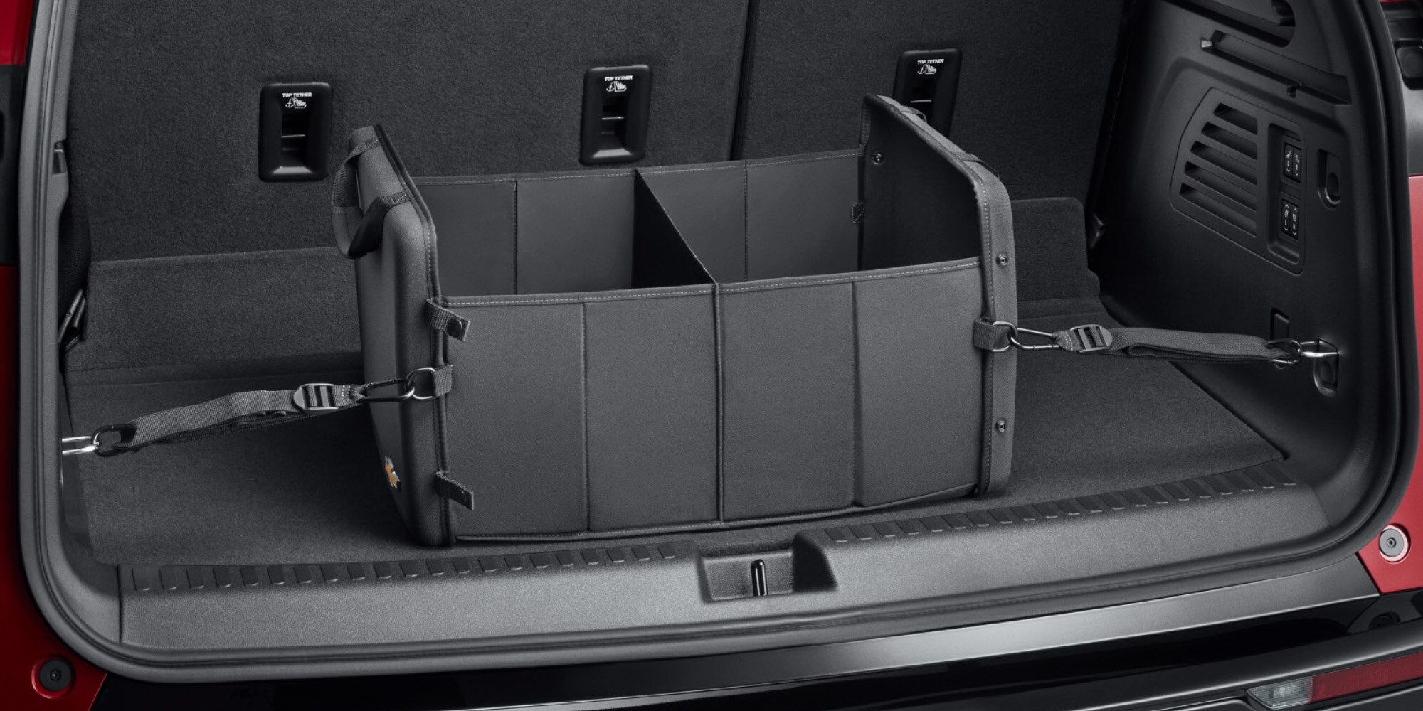 Nueva Traverse 2026, organizador de cajuela en negro con emblema Chevrolet